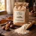 Sacchetto di farina di castagne La Dispensa del Crinale con castagne secche e foglie di castagno